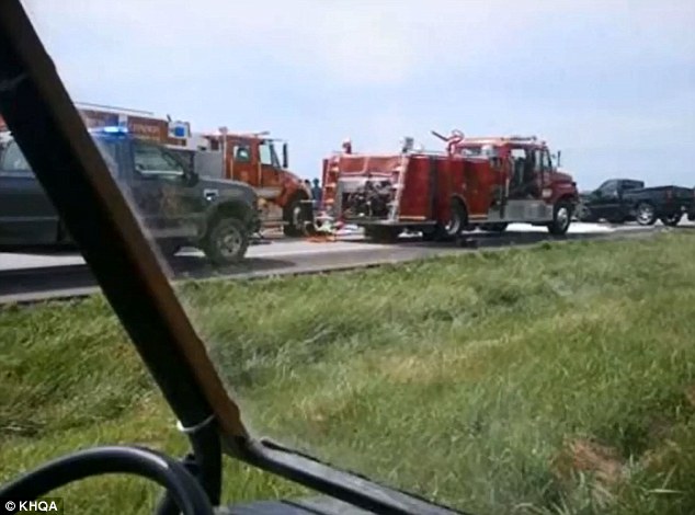 Scene: Dozens of emergency workers battled to free Katie Lentz as she lay pinned in her Mercedes wreck on Highway 19